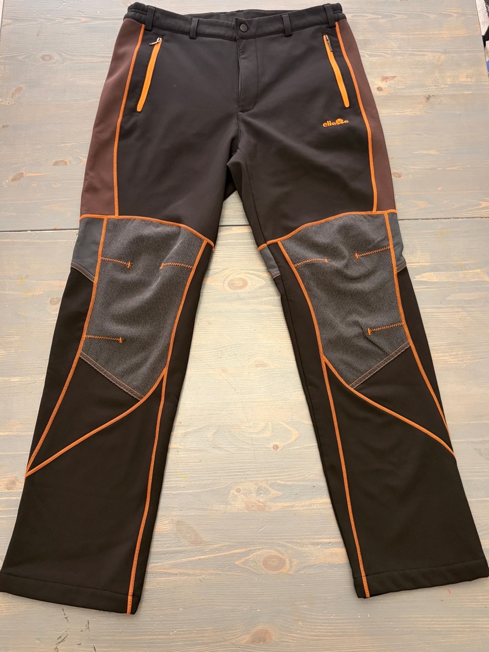 ellesse Black Jogger Pants with Orange Piping and Gray Knee Panels